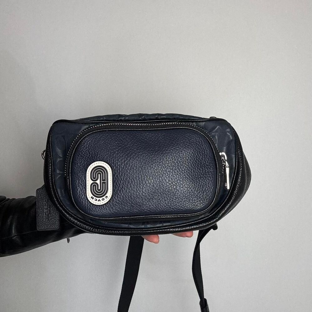 Coach court black and navy leather and signature canvas belt bag